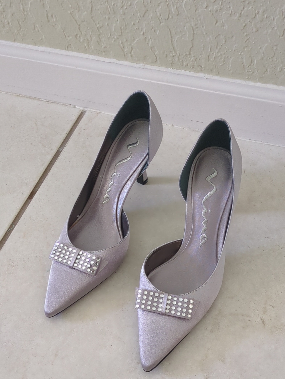 Nina Pearl Silver Pointed-Toe Heels with Studded Bow